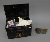 A pair of WWII 1939 dated ARP air raid warden splinter goggles and full first aid tin box.