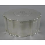 A silver tea caddy, Birmingham 1911. 15 cm wide. 478.8 grammes.