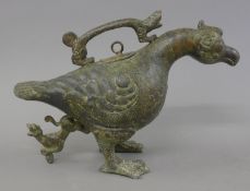 A bronze archaic style bird form censer. 20 cm high.