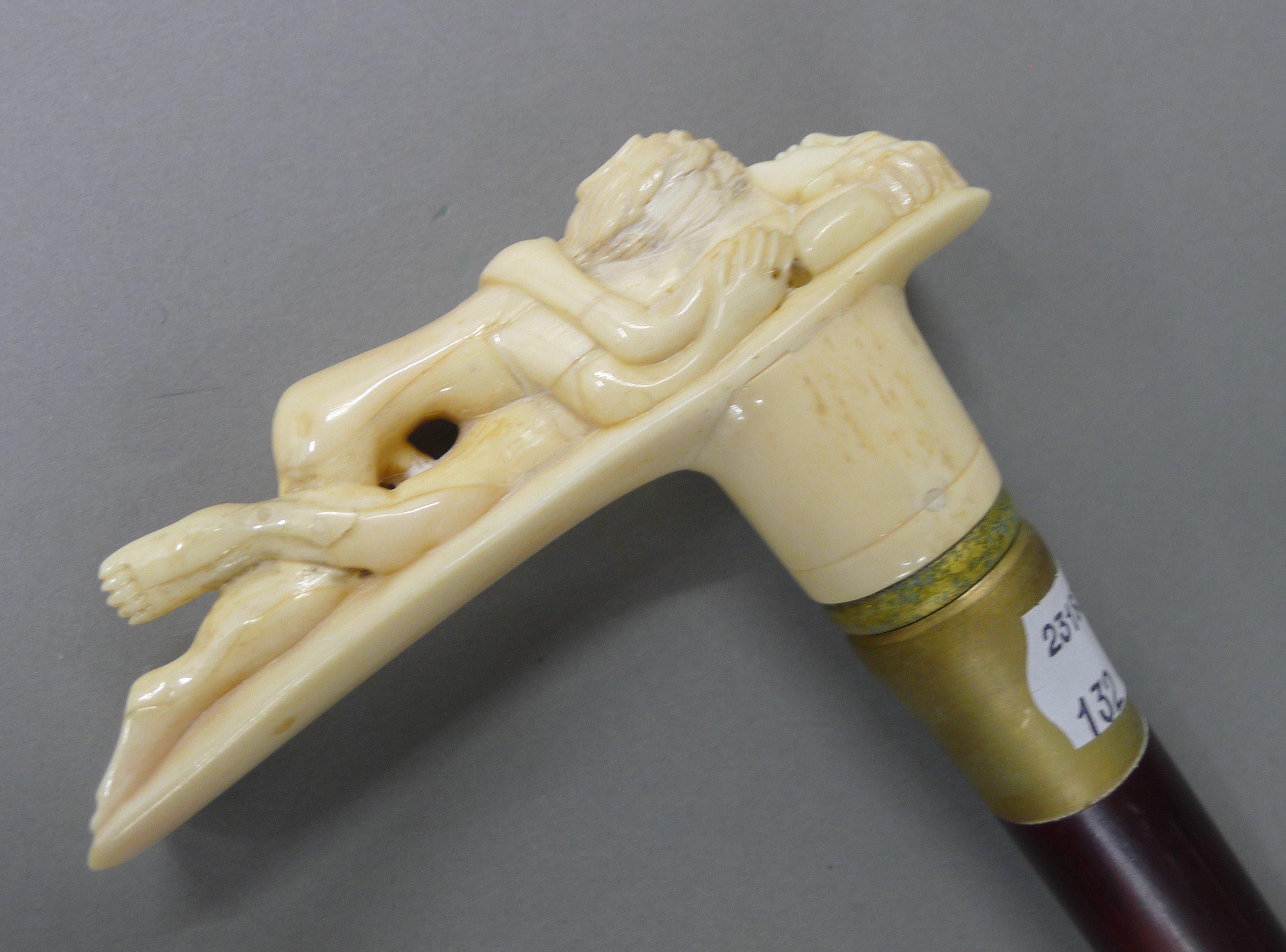 A walking stick with a carved bone erotic handle. 90 cm high. - Image 2 of 4