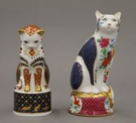 Two Royal Worcester cat form candle snuffers. The largest 10.5 cm high.