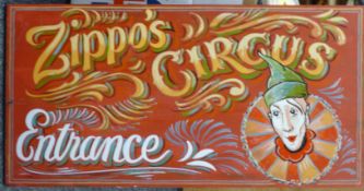 A painted sign for Zippo's Circus.