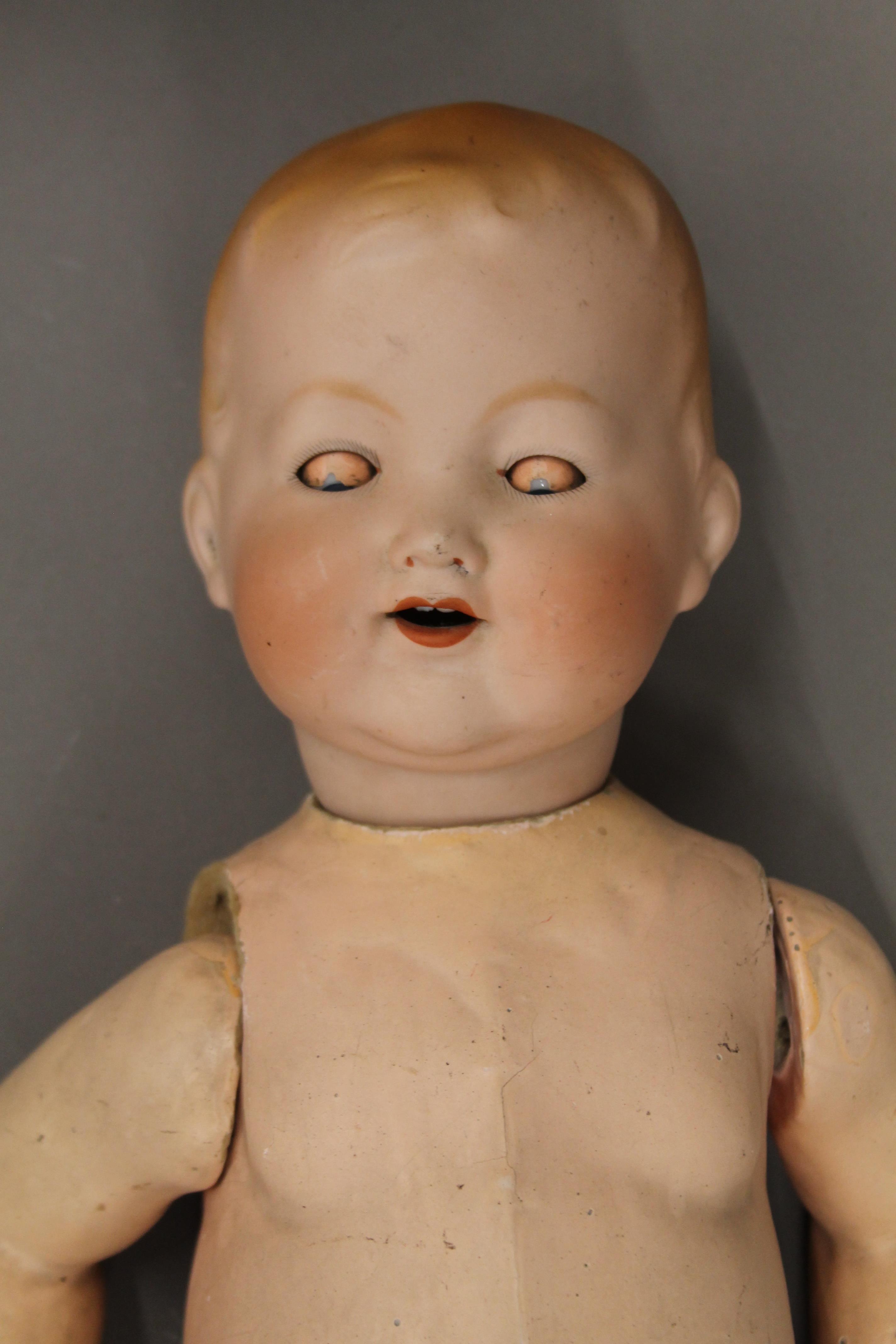 An Armand Marseille bisque headed doll, a lace Christening gown and another dolls head. - Image 3 of 6