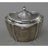 A silver tea caddy. 10 cm wide. 139.1 grammes.