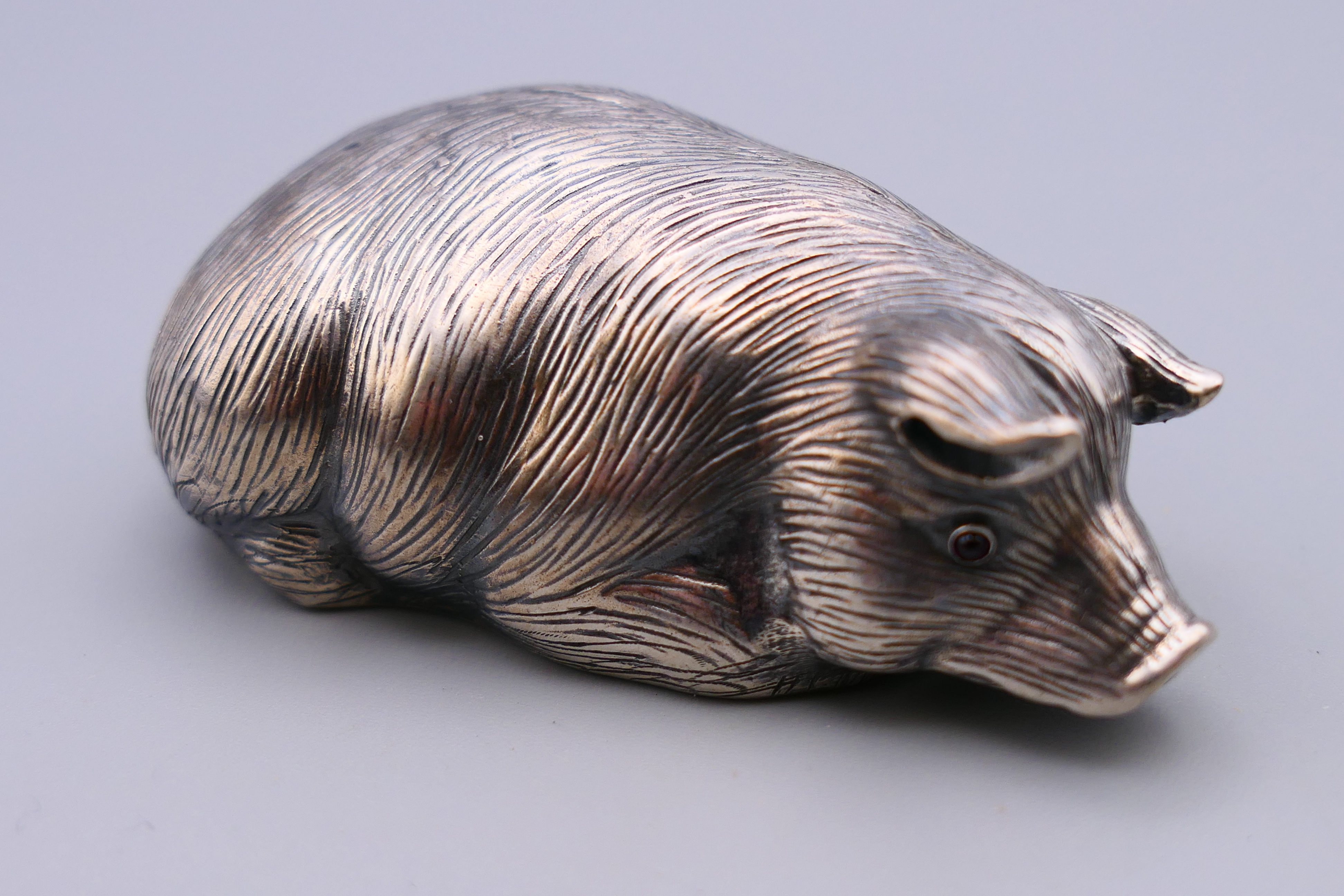 A silver model of a pig bearing Russian marks. 6 cm long.