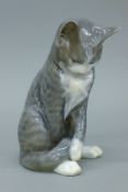 A Royal Copenhagen model of a cat. 17 cm high.