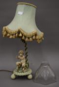 A vintage painted metal table lamp formed as Pan (55 cm high overall),