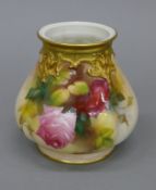 A Royal Worcester rose painted vase. 10.5 cm high.