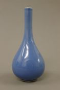 A small Chinese blue porcelain vase. 15 cm high.