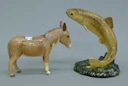 A Beswick leaping trout and a Beswick donkey. The former 16 cm high.