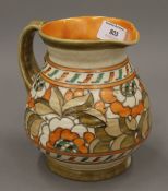 A Crown Ducal Charlotte Rhead Golden Leaves jug. 15.5 cm high.