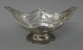 A silver pierced basket. 31.5 cm wide. 478.5 grammes.