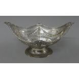 A silver pierced basket. 31.5 cm wide. 478.5 grammes.