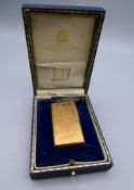 A boxed Dunhill lighter. 5.75 x 2.75 cm.