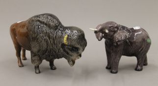 A Beswick bison and a Beswick elephant. The former 22.5 cm long.