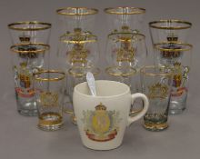 A quantity of various Royalty glasses and mugs; together with a collection of wall plates.