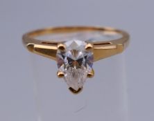 A 14 K gold solitaire pear shaped ring. Ring size T/U. 4 grammes total weight.