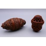 Two carved coquille nuts. 10 cm wide and 6 cm high respectively.