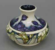 A Moorcroft June Berry vase. 9.5 cm high.