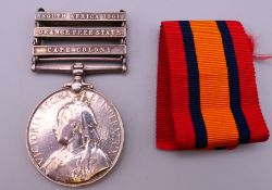 A Victorian South Africa medal with South Africa 1901 Orange Free State and Cape Colonly bars