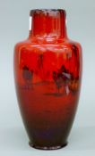 A Royal Doulton Flambe vase decorated with North African scene. 21.5 cm high.