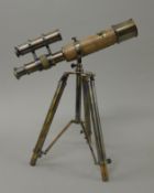 A small telescope on stand. 26.5 cm long.