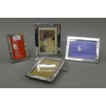 Five silver photograph frames. The largest 13 x 17.5 cm.