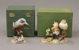 A boxed Royal Crown Derby porcelain Kingfisher and Thrush Chicks.