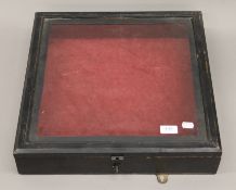 A table top display case. 45.5 cm squared.