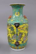 A Chinese porcelain yellow ground vase. 41.5 cm high.