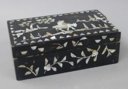 An Oriental mother-of-pearl inlaid box. 21 cm wide.
