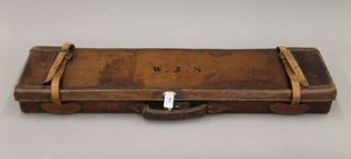 A leather shotgun case, initialled WJS, with label for John Dickson & Son, Princes Street,