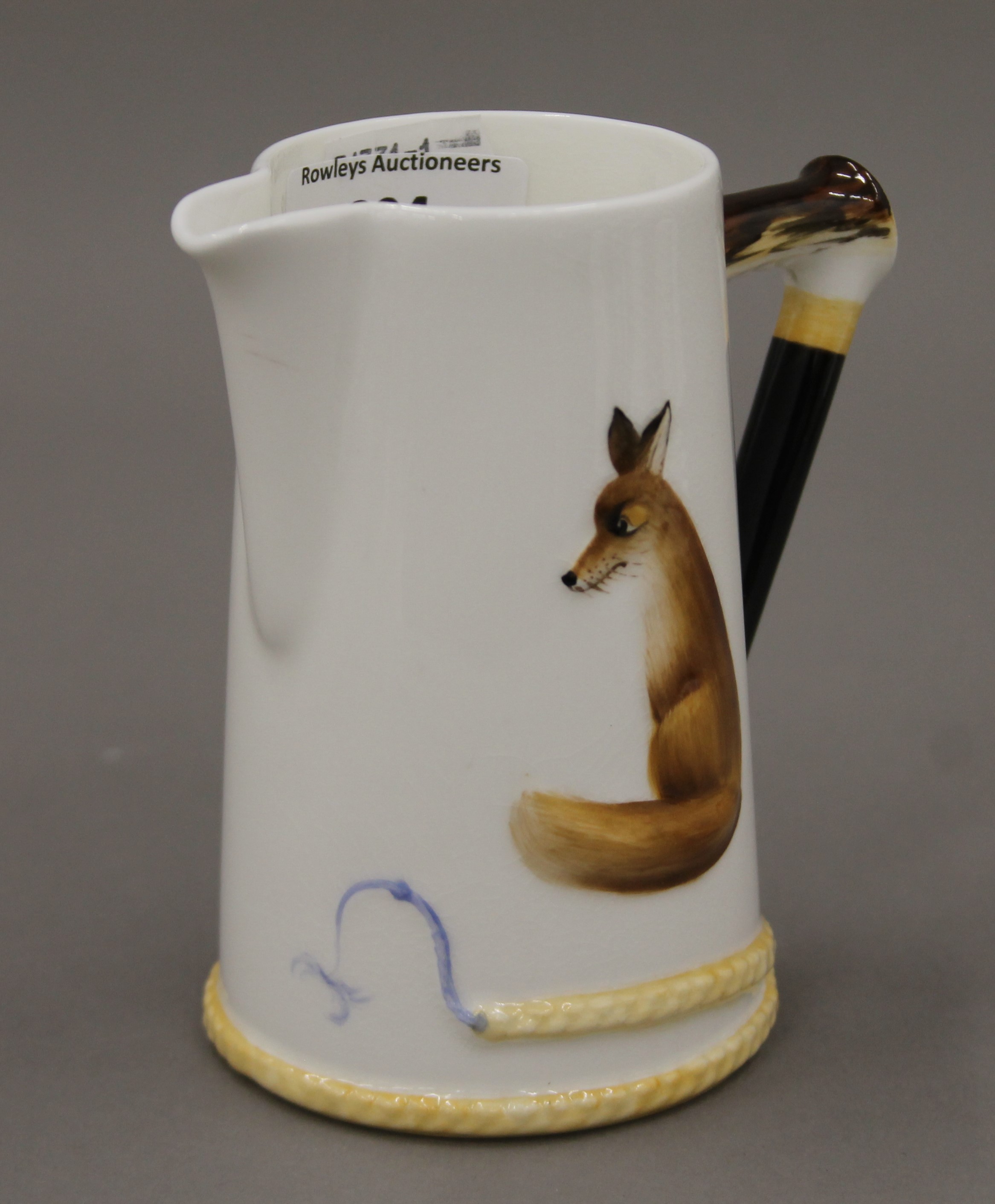 A Royal Doulton Reynard the Fox coffee can and saucer, and a cream jug. The latter 11 cm high. - Image 3 of 6