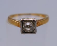 An 18 ct gold diamond solitaire ring. Ring size K/L. 2.5 grammes total weight.