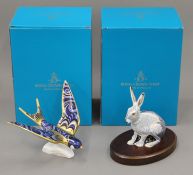 Two boxed Royal Crown Derby paperweights, Starlight Hare and Swallow.