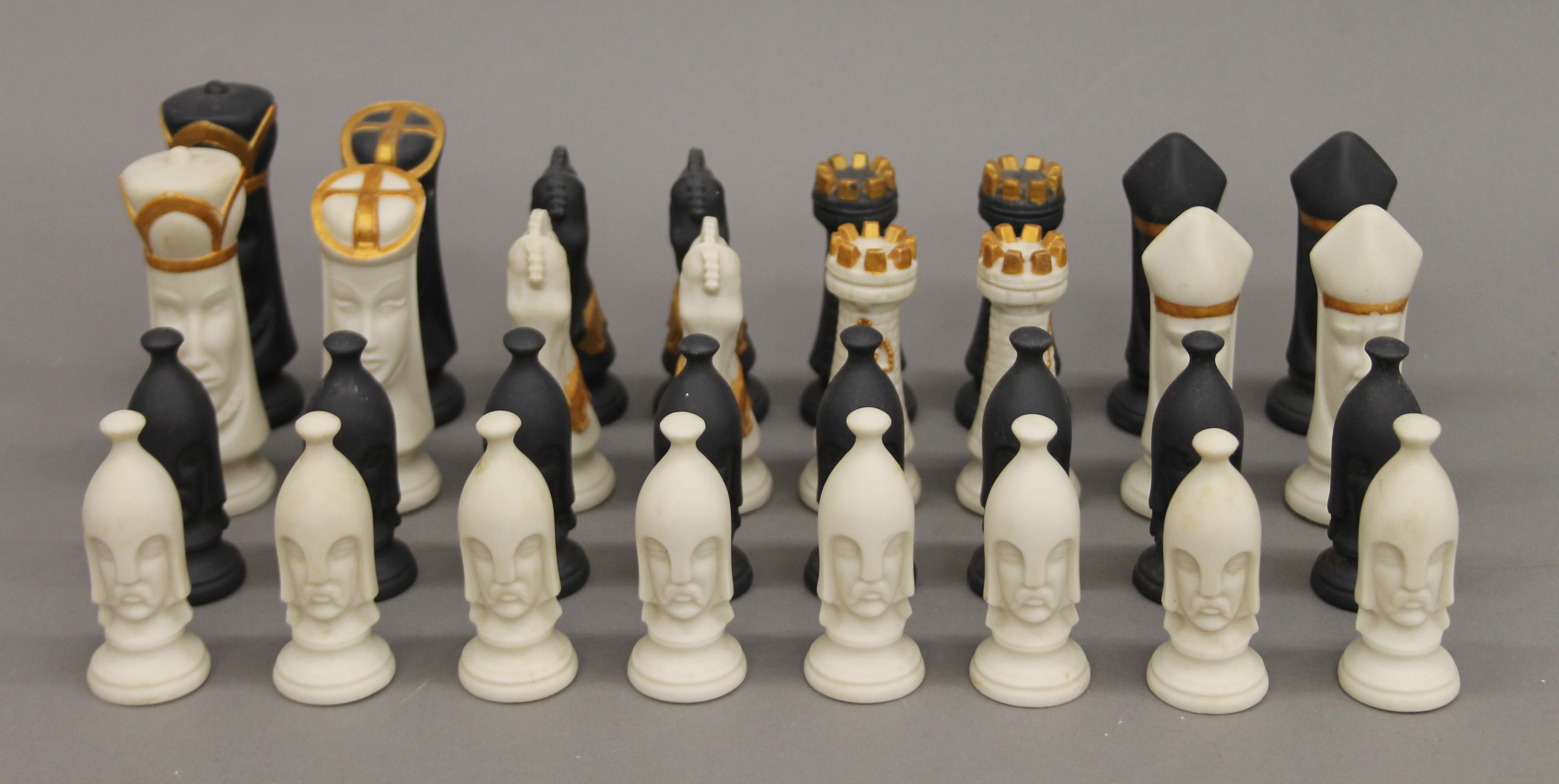 A porcelain chess set. The kings 9 cm high.