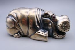 A silver model of a hippopotamus bearing Russian marks. 8 cm long.