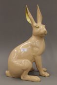 A large resin model of a hare. 49.5 cm high.