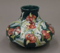 A Moorcroft Leicester vase. 14.5 cm high.