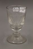 A 19th century etched Masonic glass. 14 cm high.