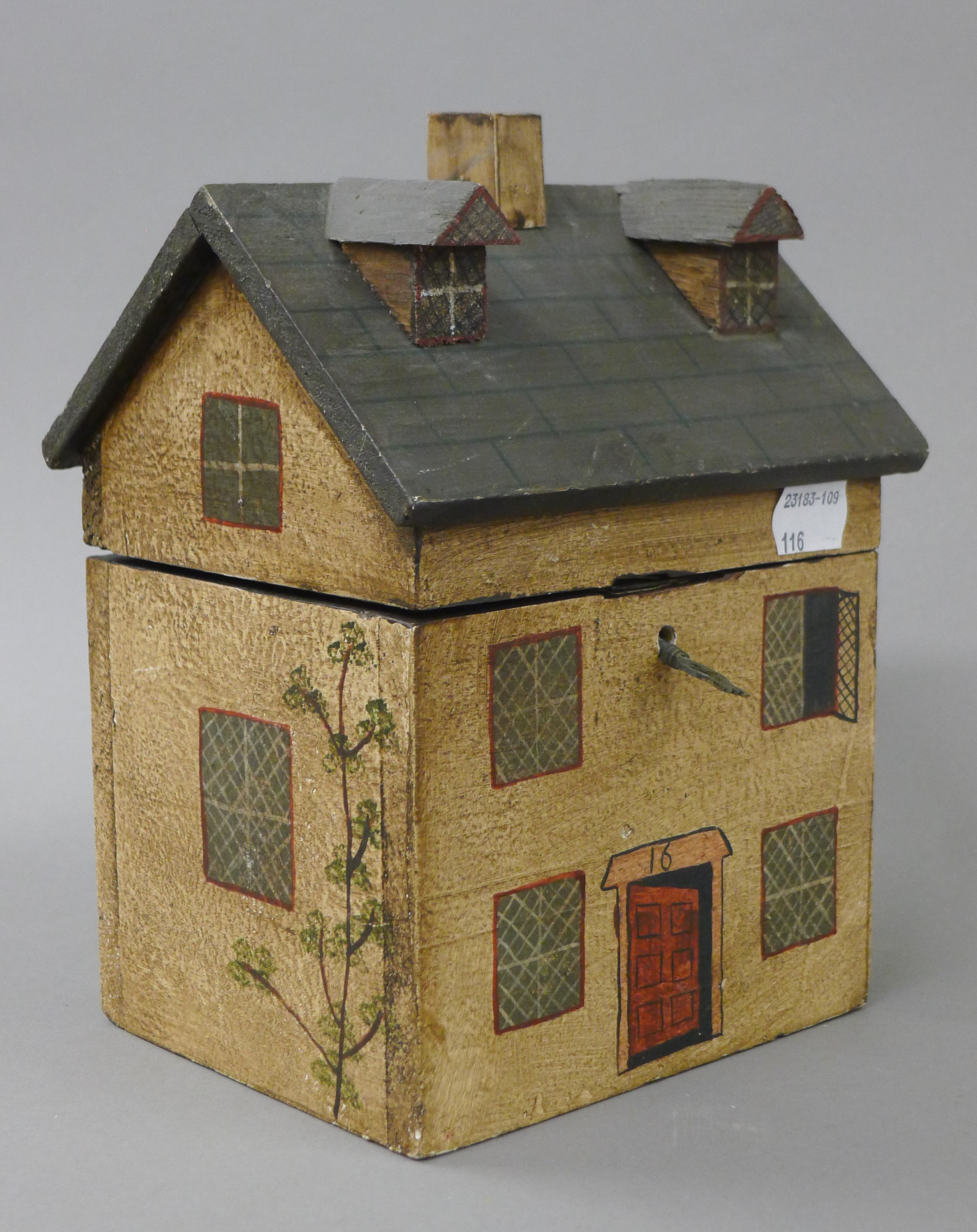 A house formed painted wooden box. 21 cm high. - Image 2 of 4