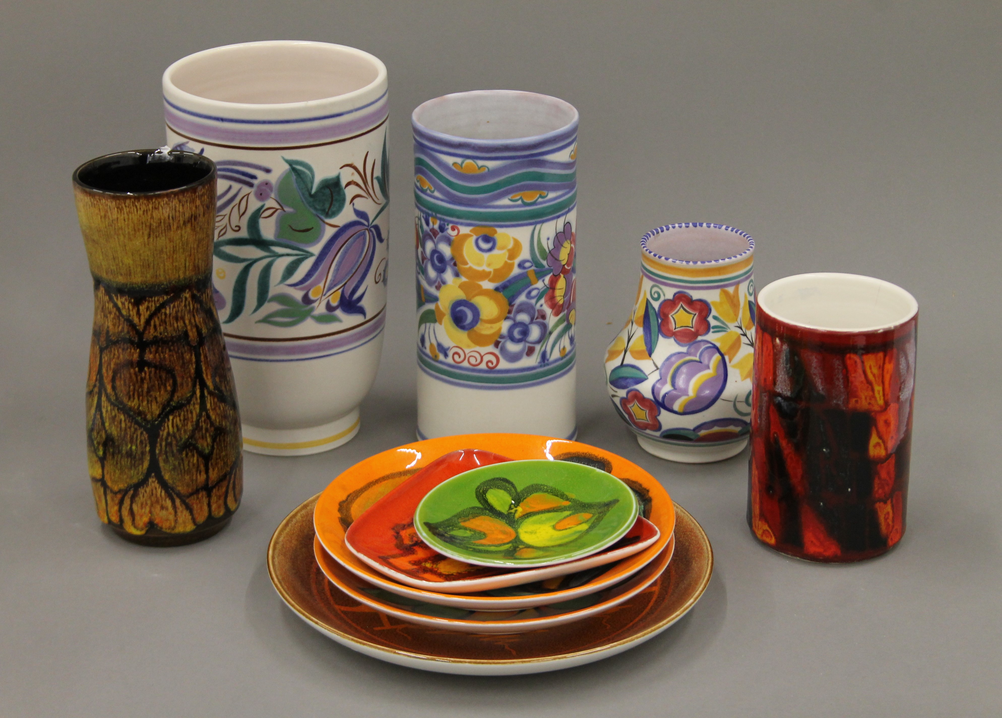 A collection of Poole pottery.