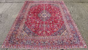 A meshed wool carpet. 366 x 280 cm.