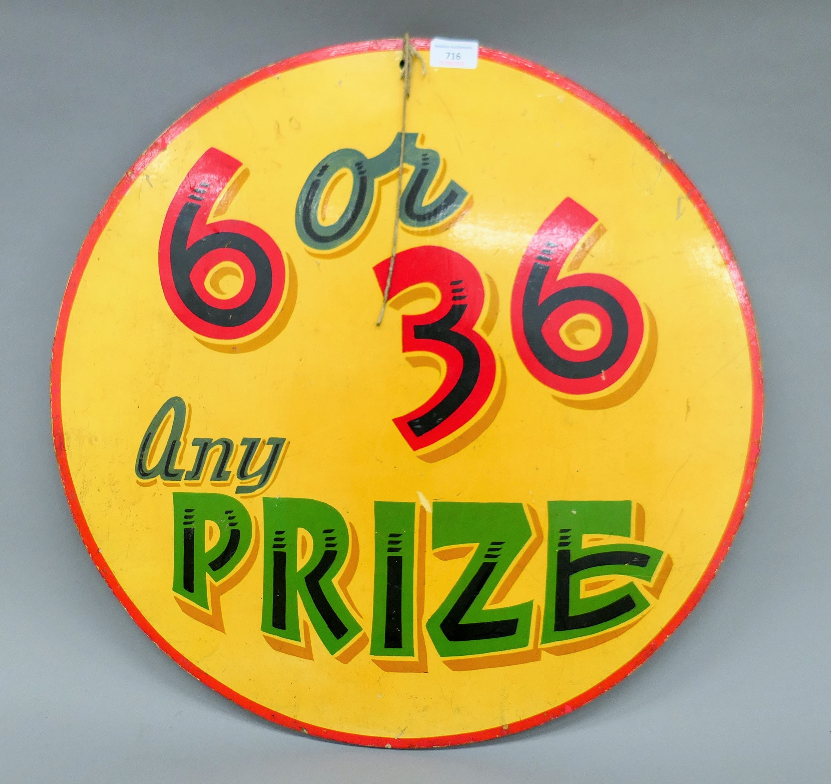 An original two sided fairground ball game sign. 60.5 cm diameter.