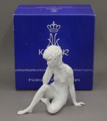 A Kaiser porcelain figurine, Musing Girl.