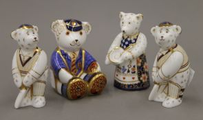 Four Royal Crown Derby teddy bear paperweights.