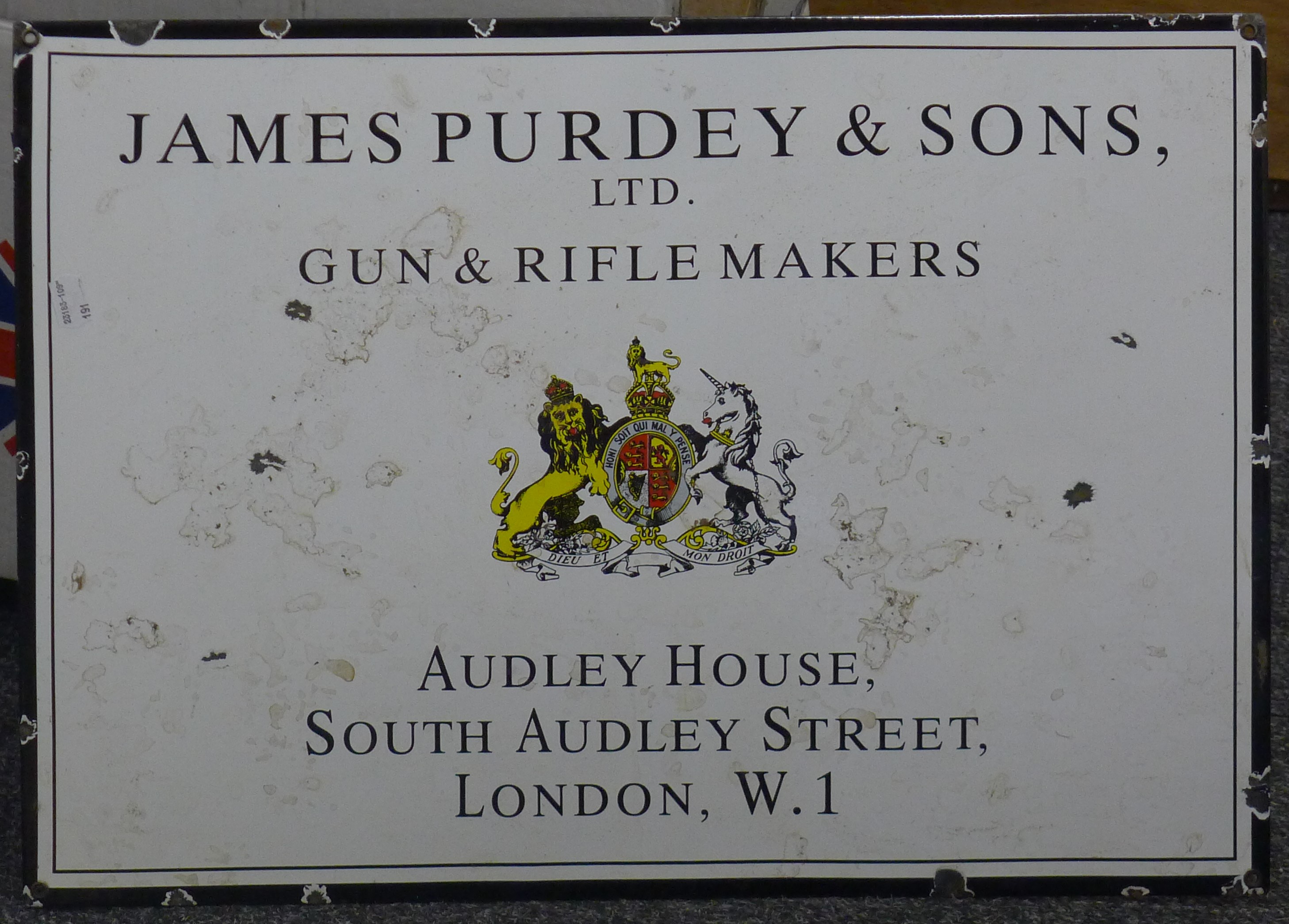 An enamel Purdey sign. 60 cm wide.