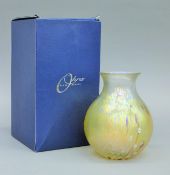 A boxed Okra glass umbrella pattern vase. 16.5 cm high.