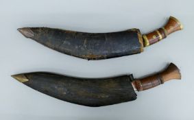 Two vintage kukris. The largest 44 cm long.