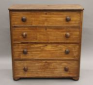A Victorian mahogany cottage cut chest of drawers. 109.5 cm wide.